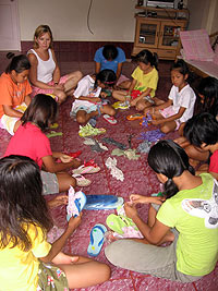 Children enjoying crafts with Katie Allred