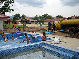 Swimming pool being filled with water