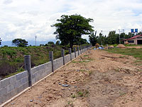 Fence being consturcted at children's village in Thailand