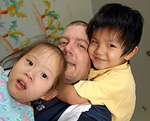 John Kay visits orphans at New Hope Foundation in China