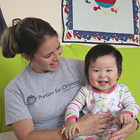 Sally with Ren Ai at New Hope Foundation